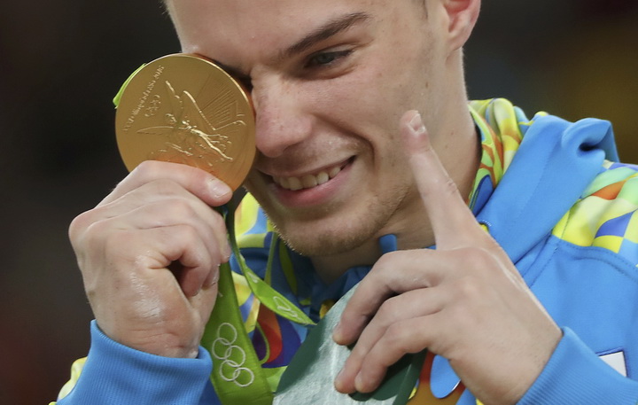 2016 Rio Olympics - Artistic Gymnastics - Men's Parallel Bars Victory Ceremony