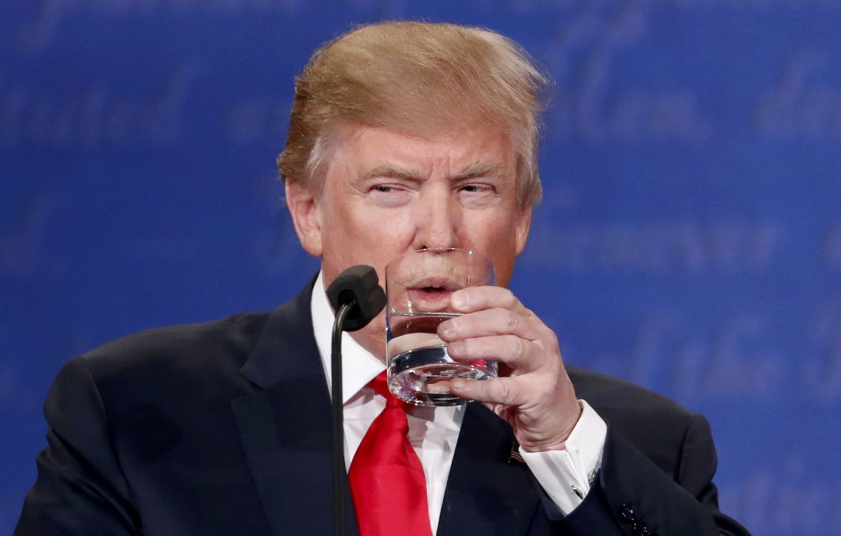 Republican U.S. presidential nominee Trump sips water during the third and final debate with Democratic nominee Clinton in Las Vegas