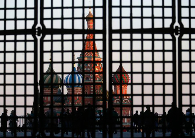 St. Basil's Cathedral is seen through a gate in Red Square in central Moscow