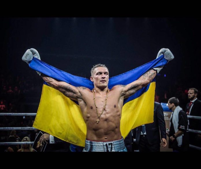 Перед двобоєм з росіянином Гасієвим прикорднонники підтримали Усика (відео) Перед двобоєм з росіянином Гасієвим прикорднонники підтримали Усика (відео)