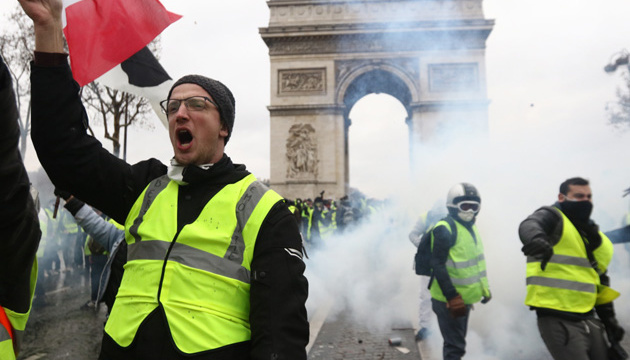 Yellow vest protest against rising fuel taxes in Paris
