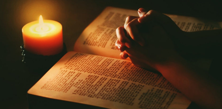 bible-candle-praying-hands-840x415