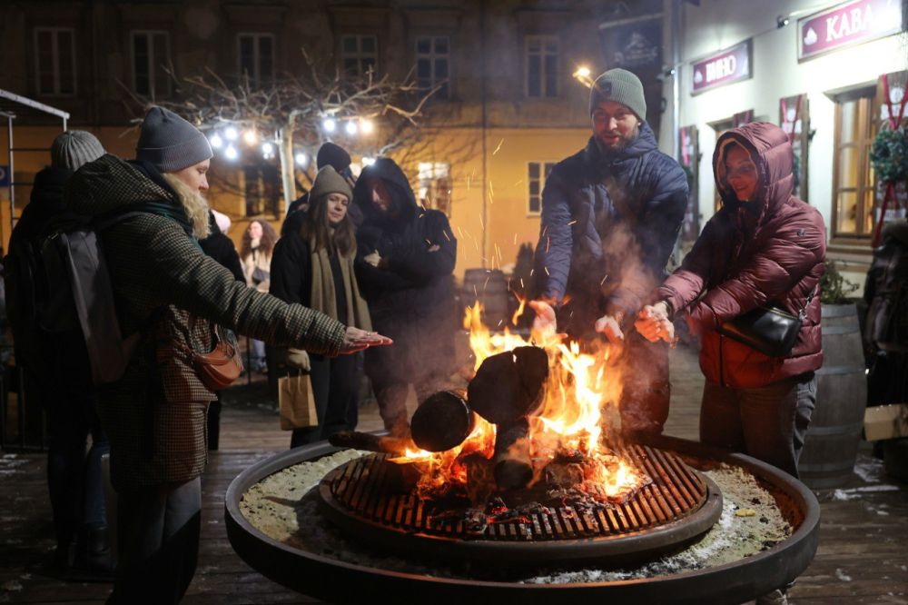 У Львові провели благодійну різдвяну екскурсію з колядою та пампухами - 4