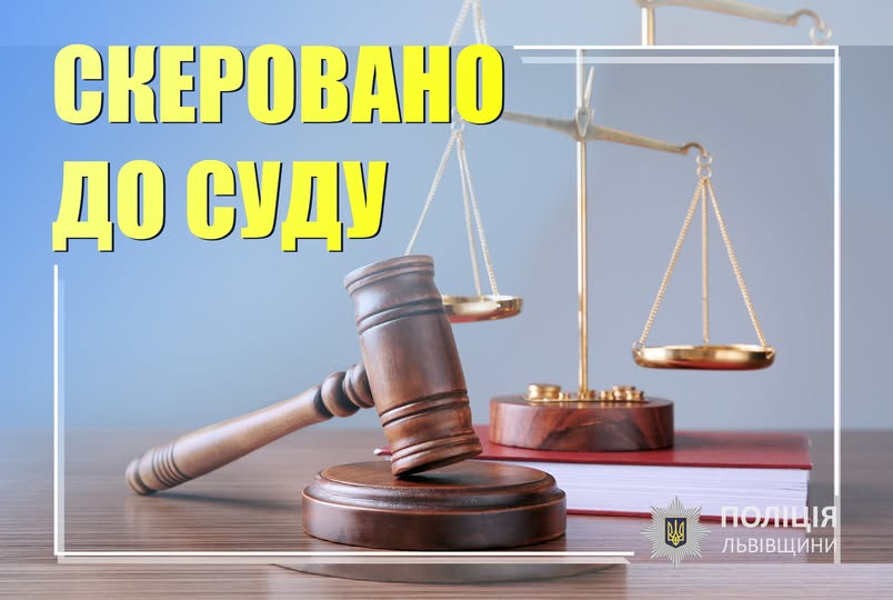 Wooden gavel and books on wooden table