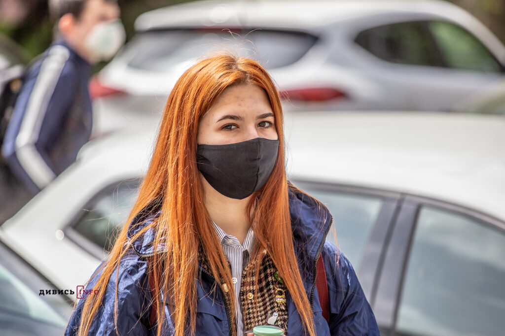 a woman wearing a face mask